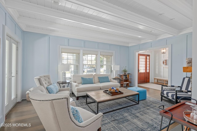 26 Bridge, Bay Head, NJ 08742 - living area with beam ceiling, wood finished floors, crown molding, and a decorative wall