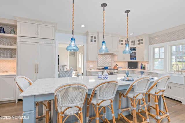 26 Bridge, Bay Head, NJ 08742 - kitchen featuring open shelves, a sink, wood finished floors, tasteful backsplash, and recessed lighting