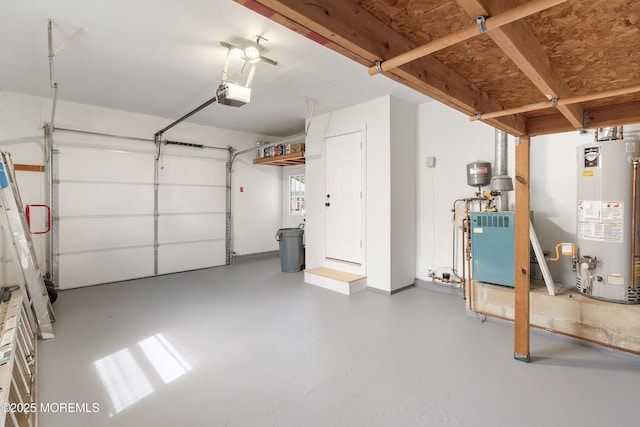 garage featuring a garage door opener and water heater