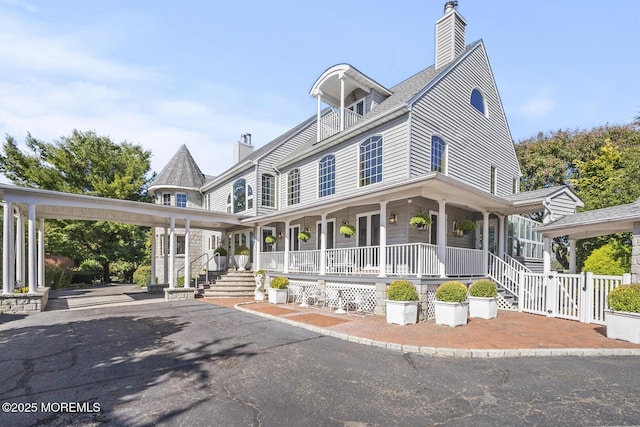 18 Schoolhouse Rd, Cream Ridge, NJ 08514 - view of front of home featuring a chimney and a porch