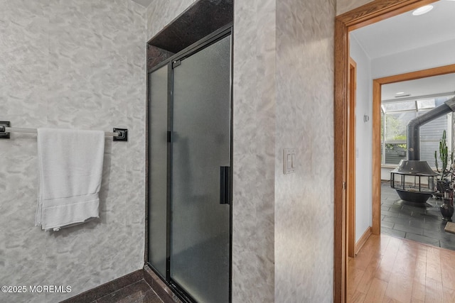18 Schoolhouse Rd, Cream Ridge, NJ 08514 - full bathroom featuring baseboards, wood finished floors, and a stall shower