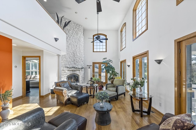 18 Schoolhouse Rd, Cream Ridge, NJ 08514 - living area featuring a ceiling fan, light wood finished floors, a high ceiling, and a wealth of natural light