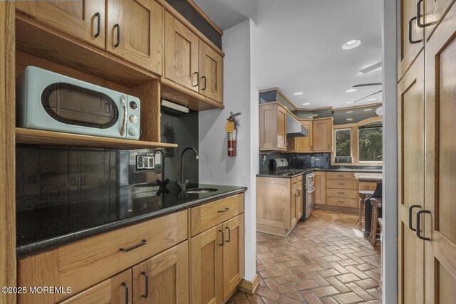 18 Schoolhouse Rd, Cream Ridge, NJ 08514 - kitchen featuring double oven range, tasteful backsplash, a sink, brick floor, and extractor fan