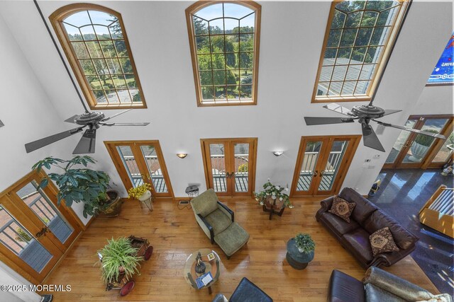 18 Schoolhouse Rd, Cream Ridge, NJ 08514 - living room featuring ceiling fan, french doors, and a high ceiling