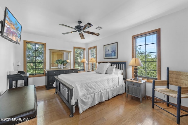 18 Schoolhouse Rd, Cream Ridge, NJ 08514 - bedroom featuring visible vents, baseboards, wood finished floors, and multiple windows