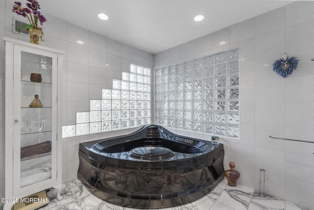18 Schoolhouse Rd, Cream Ridge, NJ 08514 - bathroom with marble finish floor, recessed lighting, tile walls, visible vents, and a garden tub
