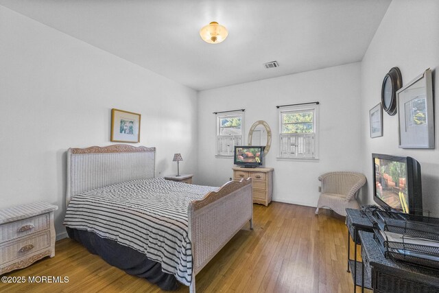 18 Schoolhouse Rd, Cream Ridge, NJ 08514 - bedroom featuring hardwood / wood-style flooring and visible vents