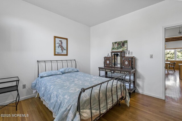 18 Schoolhouse Rd, Cream Ridge, NJ 08514 - bedroom featuring baseboards and wood finished floors