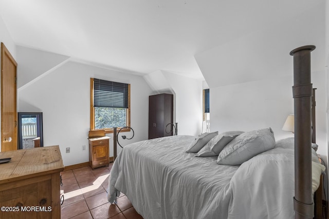 18 Schoolhouse Rd, Cream Ridge, NJ 08514 - bedroom featuring vaulted ceiling and tile patterned flooring