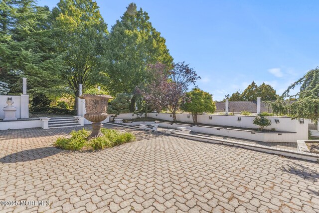 18 Schoolhouse Rd, Cream Ridge, NJ 08514 - view of property's community featuring a patio area and fence