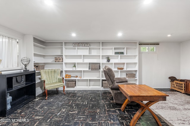 sitting room featuring carpet floors and recessed lighting