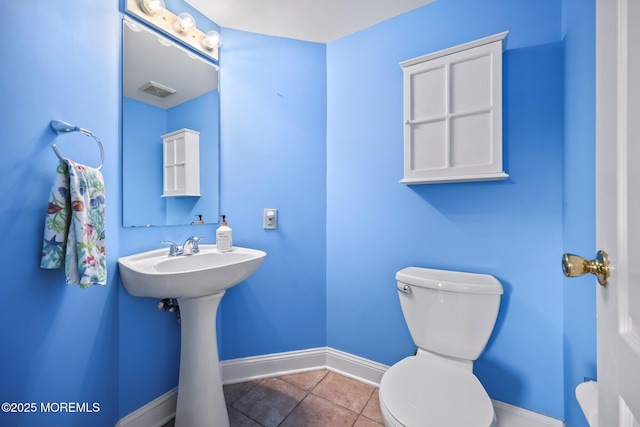 604 Gaitway Ct, Freehold, NJ 07728 - bathroom with baseboards, a sink, tile patterned flooring, and toilet