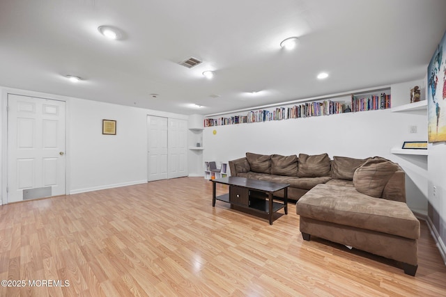 604 Gaitway Ct, Freehold, NJ 07728 - living room featuring baseboards, light wood-style flooring, and visible vents