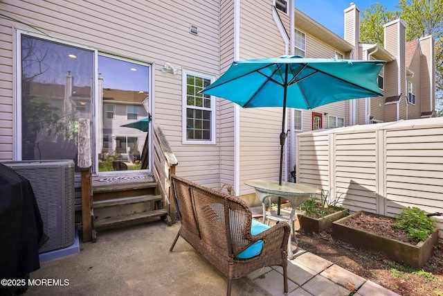 604 Gaitway Ct, Freehold, NJ 07728 - view of patio / terrace featuring a garden, fence, and cooling unit