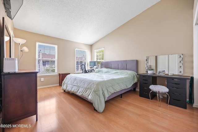 604 Gaitway Ct, Freehold, NJ 07728 - bedroom featuring baseboards, a textured ceiling, wood finished floors, and multiple windows
