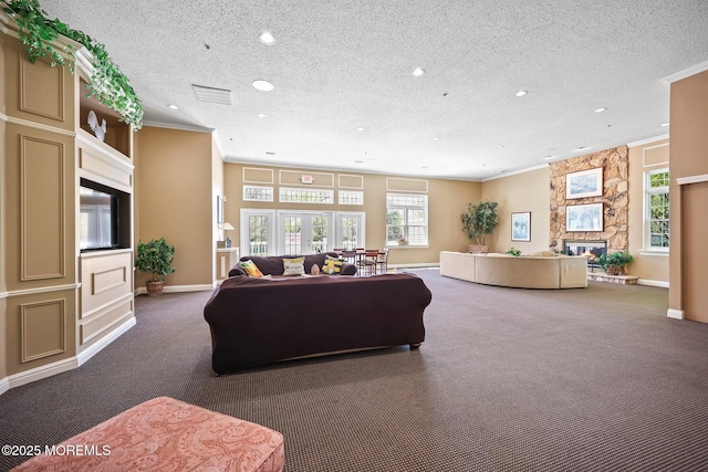 604 Gaitway Ct, Freehold, NJ 07728 - living room with recessed lighting, crown molding, dark carpet, and a textured ceiling