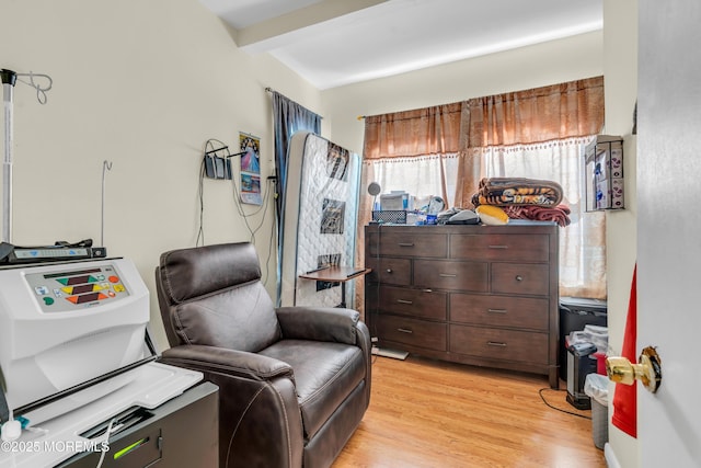 24 Monmouth Ave, Freehold, NJ 07728 - sitting room with beamed ceiling and light wood finished floors