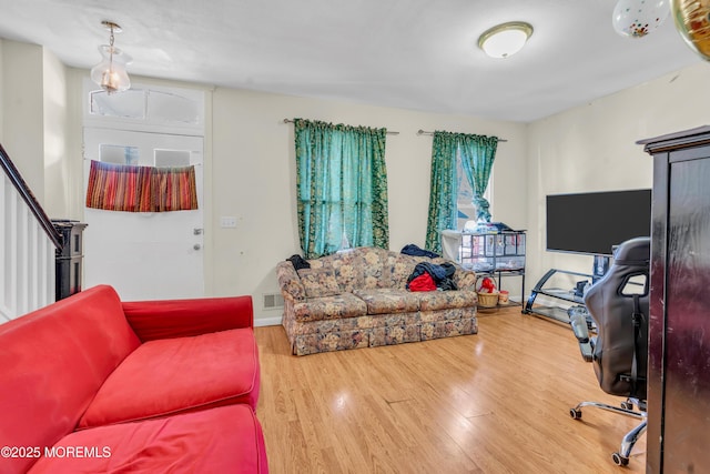 24 Monmouth Ave, Freehold, NJ 07728 - living room featuring wood finished floors and visible vents