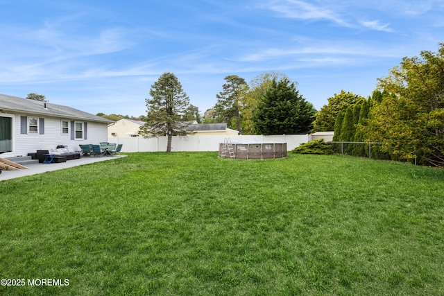 303 Savannah Rd, Toms River, NJ 08757 - view of yard with a fenced in pool, a fenced backyard, and a patio area