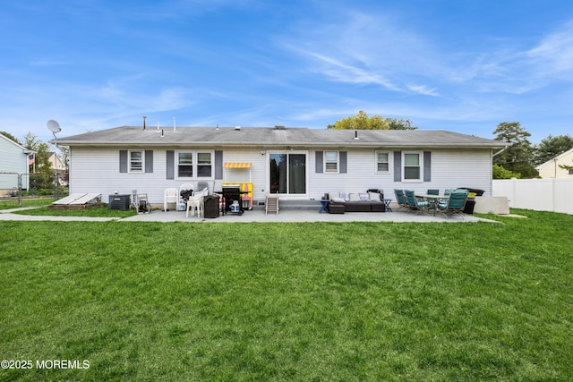 303 Savannah Rd, Toms River, NJ 08757 - rear view of house featuring fence, a patio, and a lawn