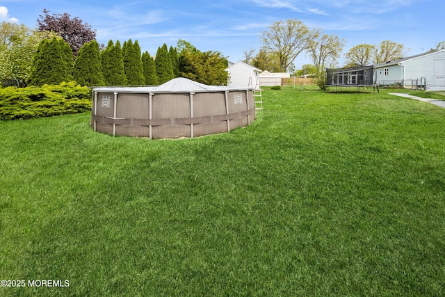 303 Savannah Rd, Toms River, NJ 08757 - view of yard with fence and a trampoline