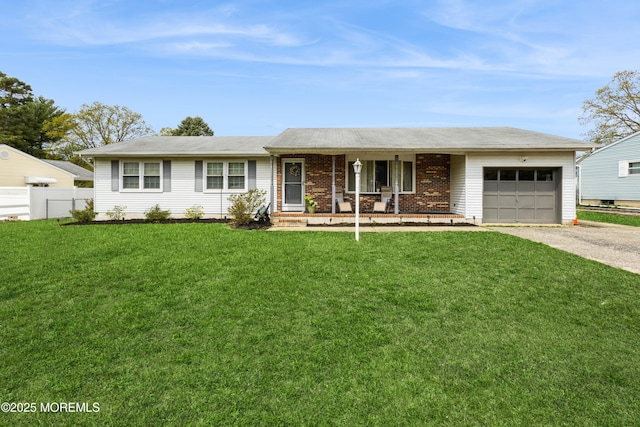 303 Savannah Rd, Toms River, NJ 08757 - ranch-style home with fence, driveway, a front lawn, and a garage