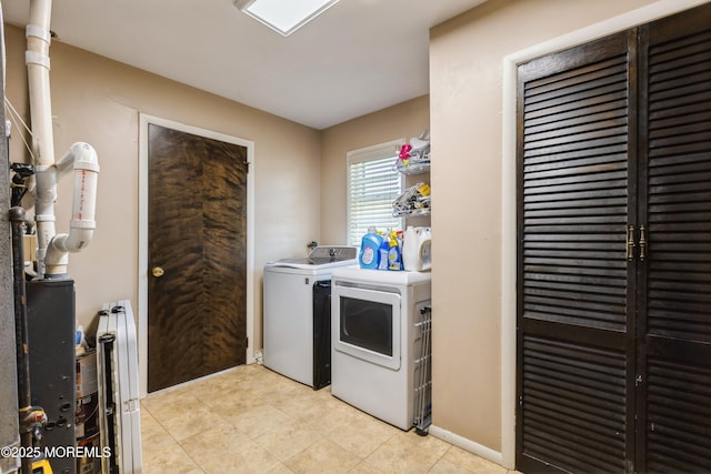 303 Savannah Rd, Toms River, NJ 08757 - washroom with washing machine and clothes dryer, light tile patterned flooring, and laundry area