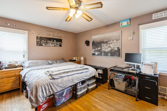 303 Savannah Rd, Toms River, NJ 08757 - bedroom featuring a ceiling fan, multiple windows, and wood finished floors