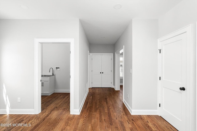 440 Ellisdale Rd, Chesterfield, NJ 08515 - hall with baseboards, a sink, and wood finished floors