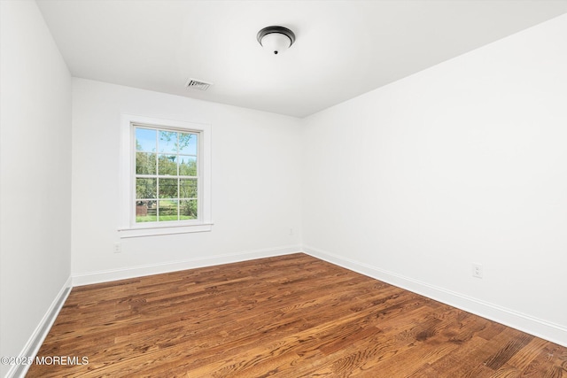 440 Ellisdale Rd, Chesterfield, NJ 08515 - spare room featuring baseboards, wood finished floors, and visible vents