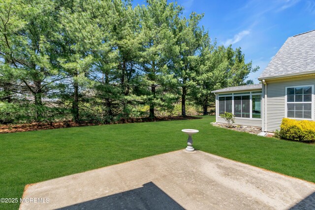 21 Edgeworth Cir, Manchester, NJ 08759 - view of yard with a sunroom