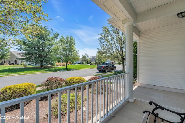 21 Edgeworth Cir, Manchester, NJ 08759 - balcony featuring covered porch and a residential view