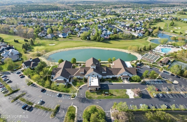 21 Edgeworth Cir, Manchester, NJ 08759 - aerial overview of property's location featuring a large body of water, nearby suburban area, and a local golf course