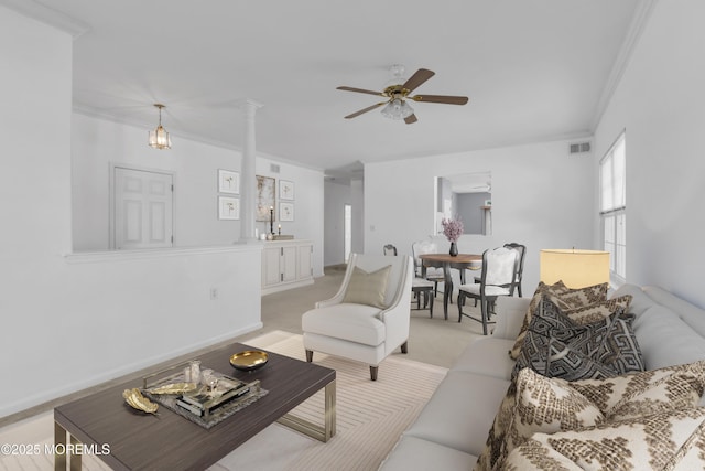 21 Edgeworth Cir, Manchester, NJ 08759 - living area with crown molding, a ceiling fan, and light carpet