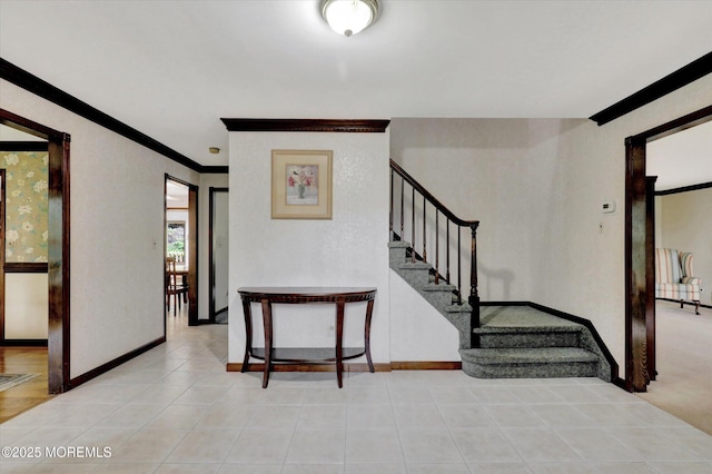 9 Berkshire Ct, Holmdel, NJ 07733 - stairway featuring tile patterned flooring, baseboards, and ornamental molding