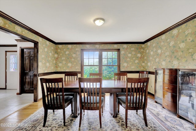 9 Berkshire Ct, Holmdel, NJ 07733 - dining space with wainscoting, wood finished floors, wallpapered walls, and crown molding