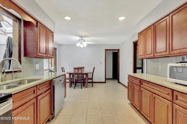 9 Berkshire Ct, Holmdel, NJ 07733 - kitchen featuring stainless steel dishwasher, a sink, white microwave, backsplash, and recessed lighting