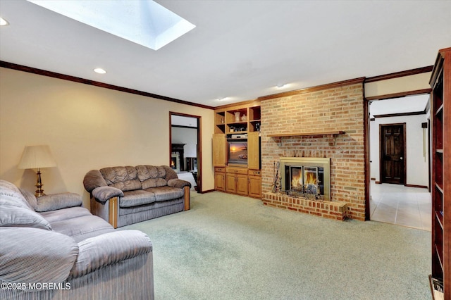 9 Berkshire Ct, Holmdel, NJ 07733 - living area featuring light carpet, ornamental molding, a brick fireplace, recessed lighting, and a skylight