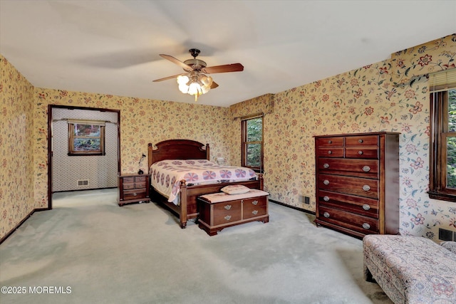 9 Berkshire Ct, Holmdel, NJ 07733 - carpeted bedroom featuring wallpapered walls, multiple windows, and ceiling fan