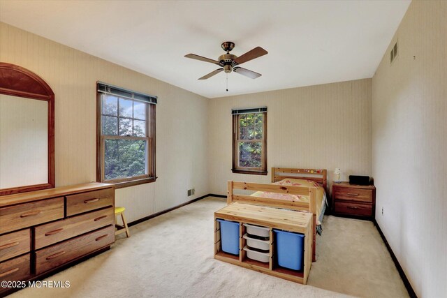9 Berkshire Ct, Holmdel, NJ 07733 - carpeted bedroom with baseboards and a ceiling fan