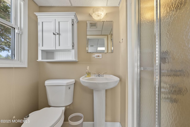 bathroom featuring toilet and a sink