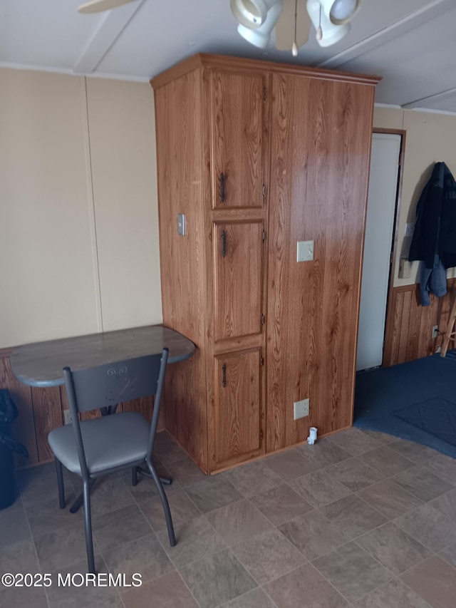 interior space featuring wooden walls