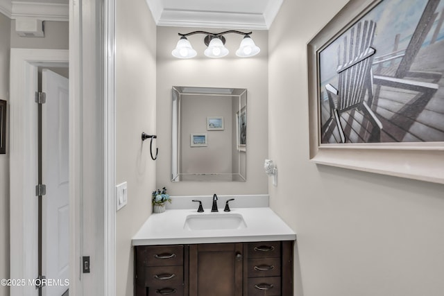 bathroom featuring vanity and ornamental molding