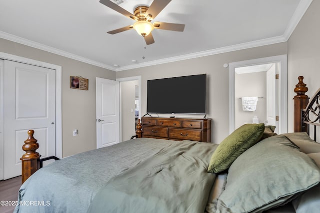 bedroom with ornamental molding, wood finished floors, and a ceiling fan