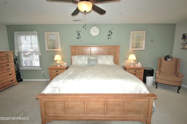 711 Edmunds Ave, Union Beach, NJ 07735 - bedroom with visible vents, baseboards, ceiling fan, and light carpet