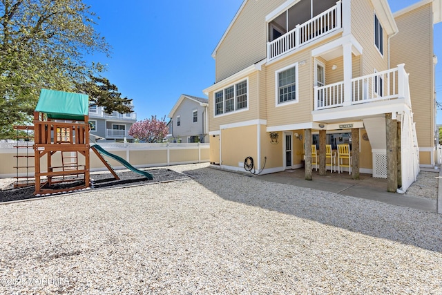 305 W 18th St, Ship Bottom, NJ 08008 - back of property featuring a playground