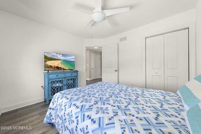 305 W 18th St, Ship Bottom, NJ 08008 - bedroom with dark wood-style floors, baseboards, a closet, and a ceiling fan