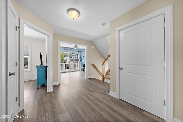 305 W 18th St, Ship Bottom, NJ 08008 - hall with wood finished floors, baseboards, and an upstairs landing