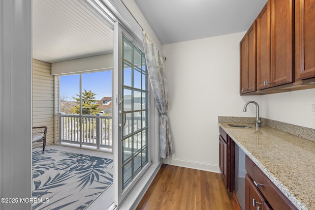 305 W 18th St, Ship Bottom, NJ 08008 - laundry room with a sink, dark wood-type flooring, and baseboards
