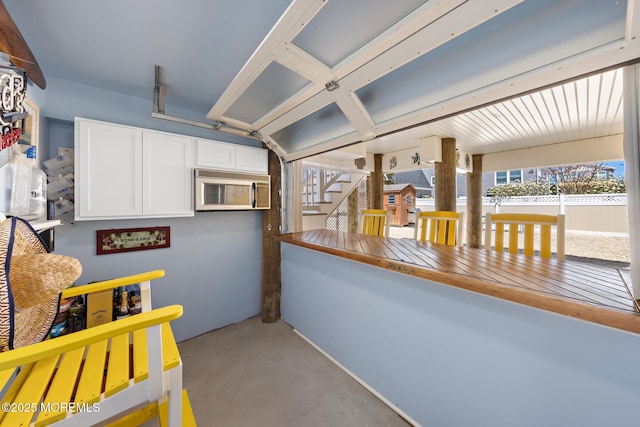 305 W 18th St, Ship Bottom, NJ 08008 - interior space with concrete flooring and white cabinets